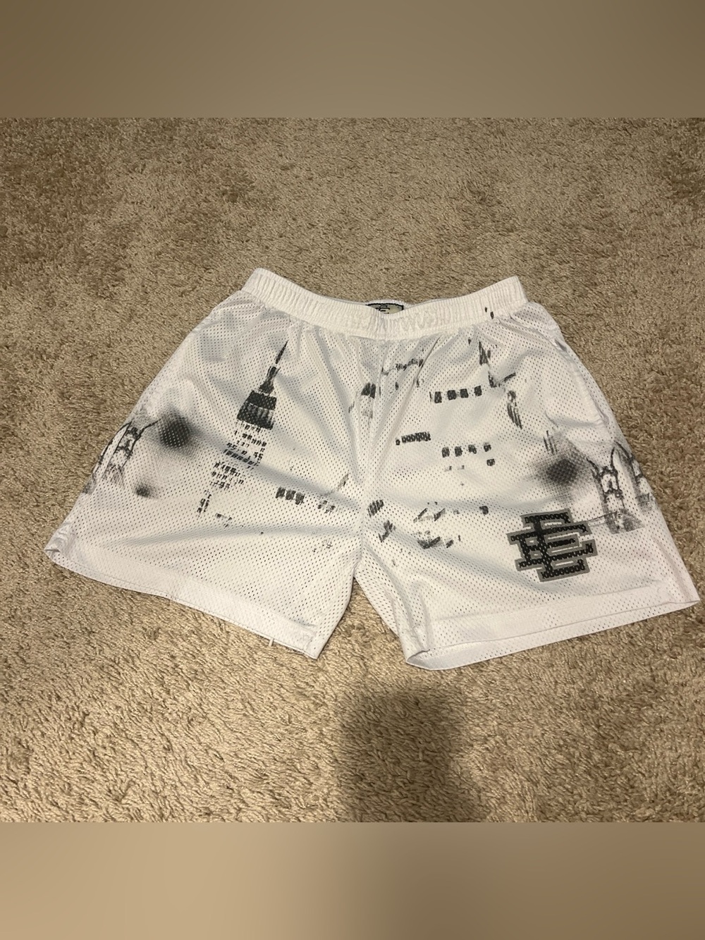 Eric Emanuel White Mesh Athletic Shorts with Black Spray City Graphic